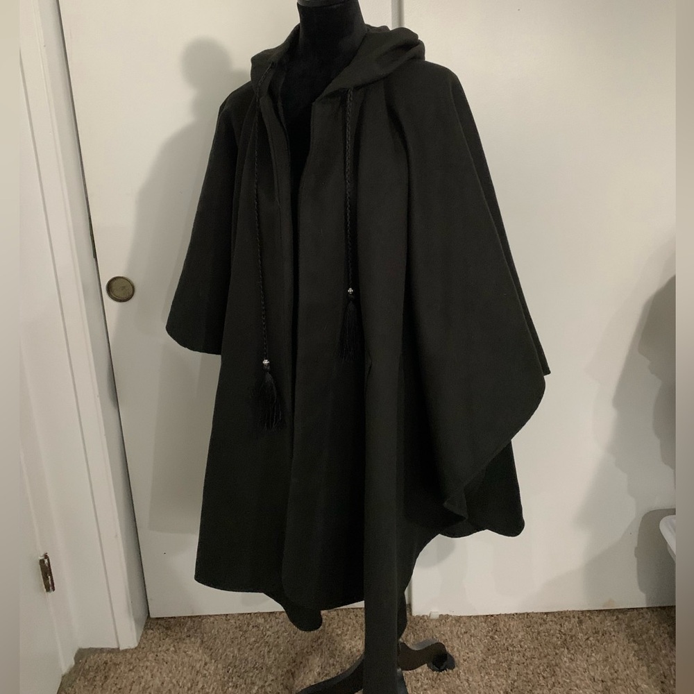 Never worn with tags size medium pancho